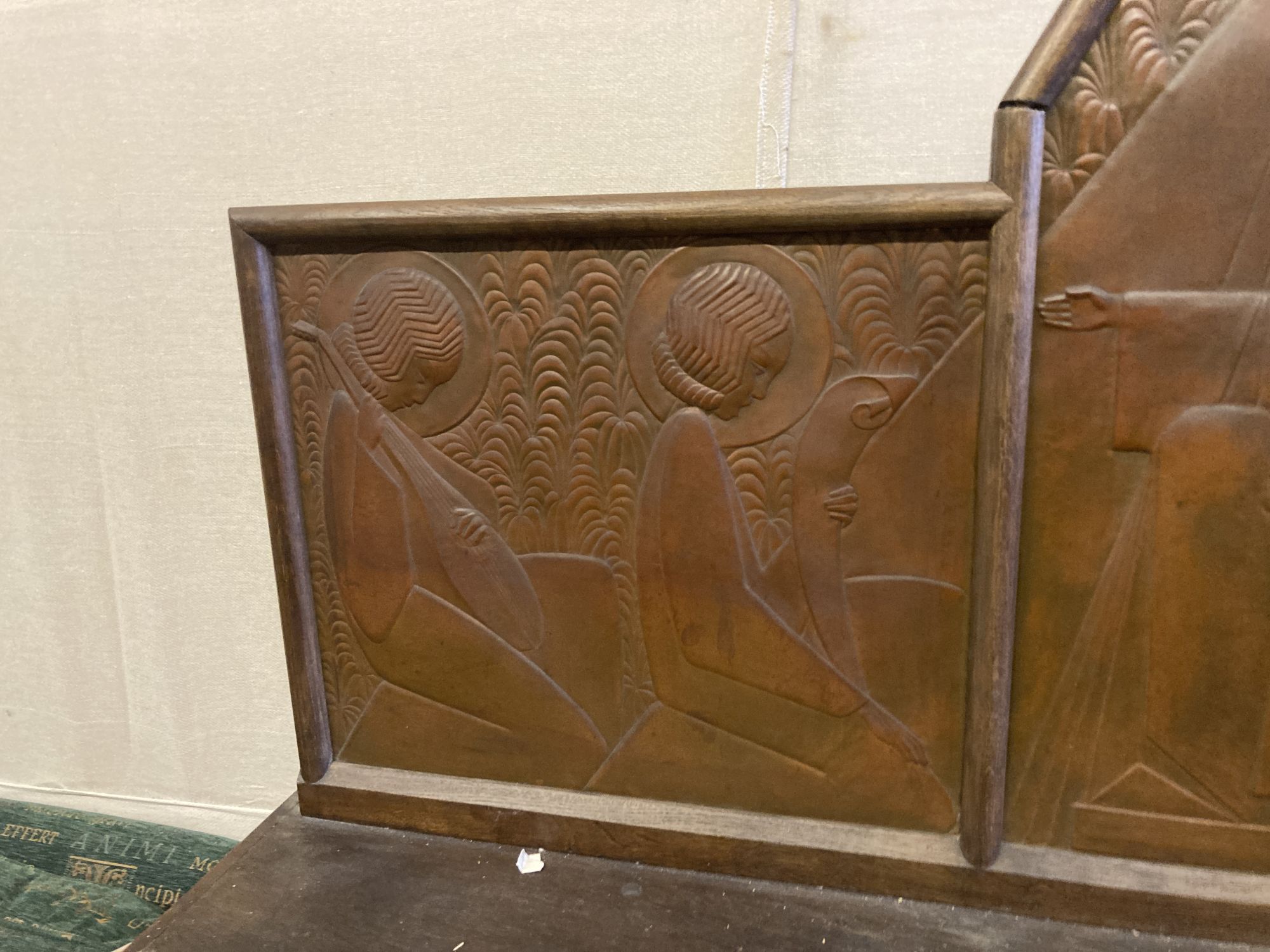 An Arts & Crafts oak and embossed copper triptych by Felix Jacques, signed and dated 1928, width 175cm, depth 26cm, height 112cm